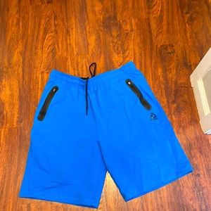 Reebok blue size large men’s sweat shorts.